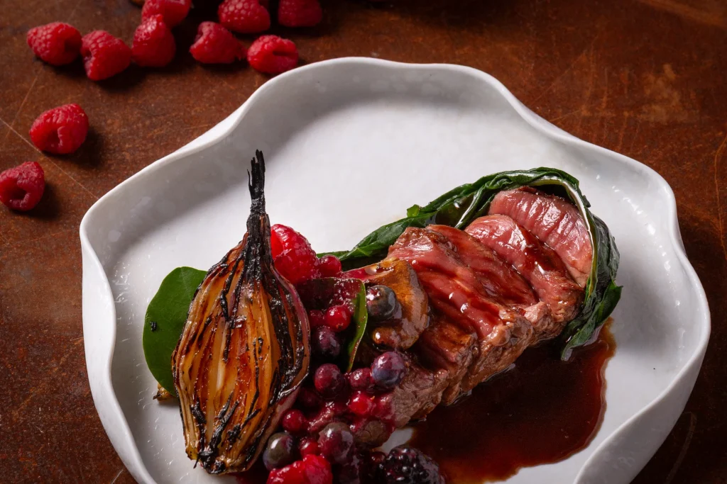 A Cuculia creation with roasted vegetables and red berries