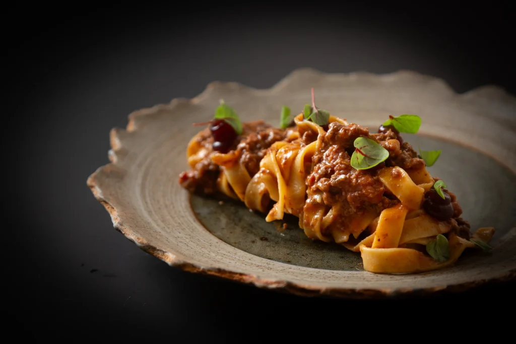Fresh pasta with ragù prepared in the Cuculia kitchen