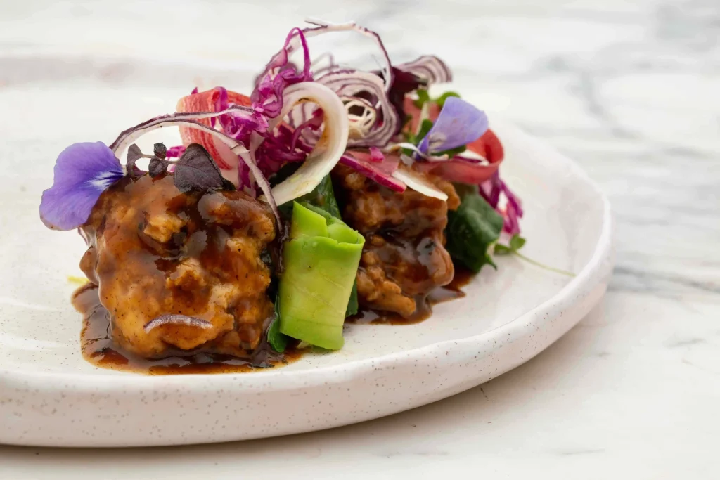 Seitan with vegetables and fresh herbs